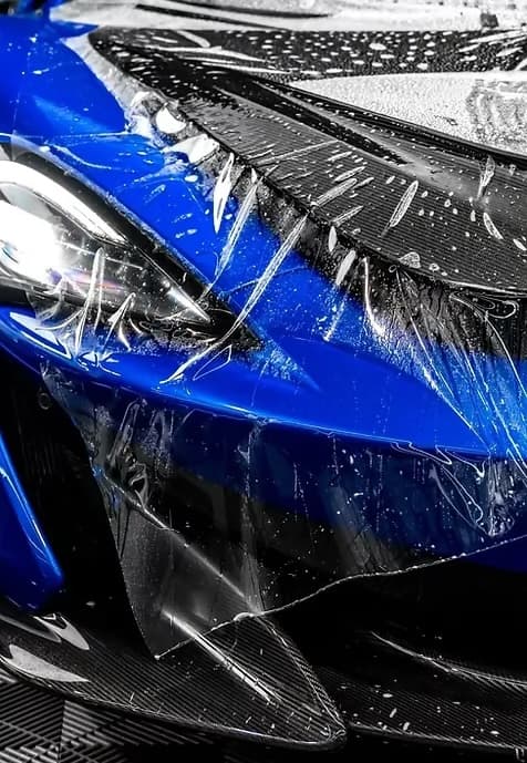 Professional PPF clear bra installation protecting luxury car paint in Bellevue Washington